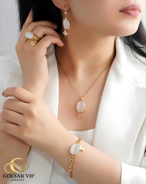 سرویس استیل طلایی طرح نگین سفید آویز پروانه