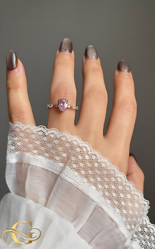 خرید انگشتر استیل نگین صورتی ژوپینگ