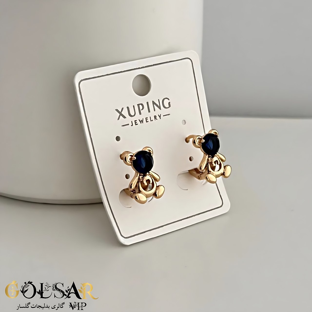 گوشواره تدی نگین بنفش تیره رنگ ثابت و ضد حساسیت آلیاژ استیل با آبکاری طلا کیفیت بالا