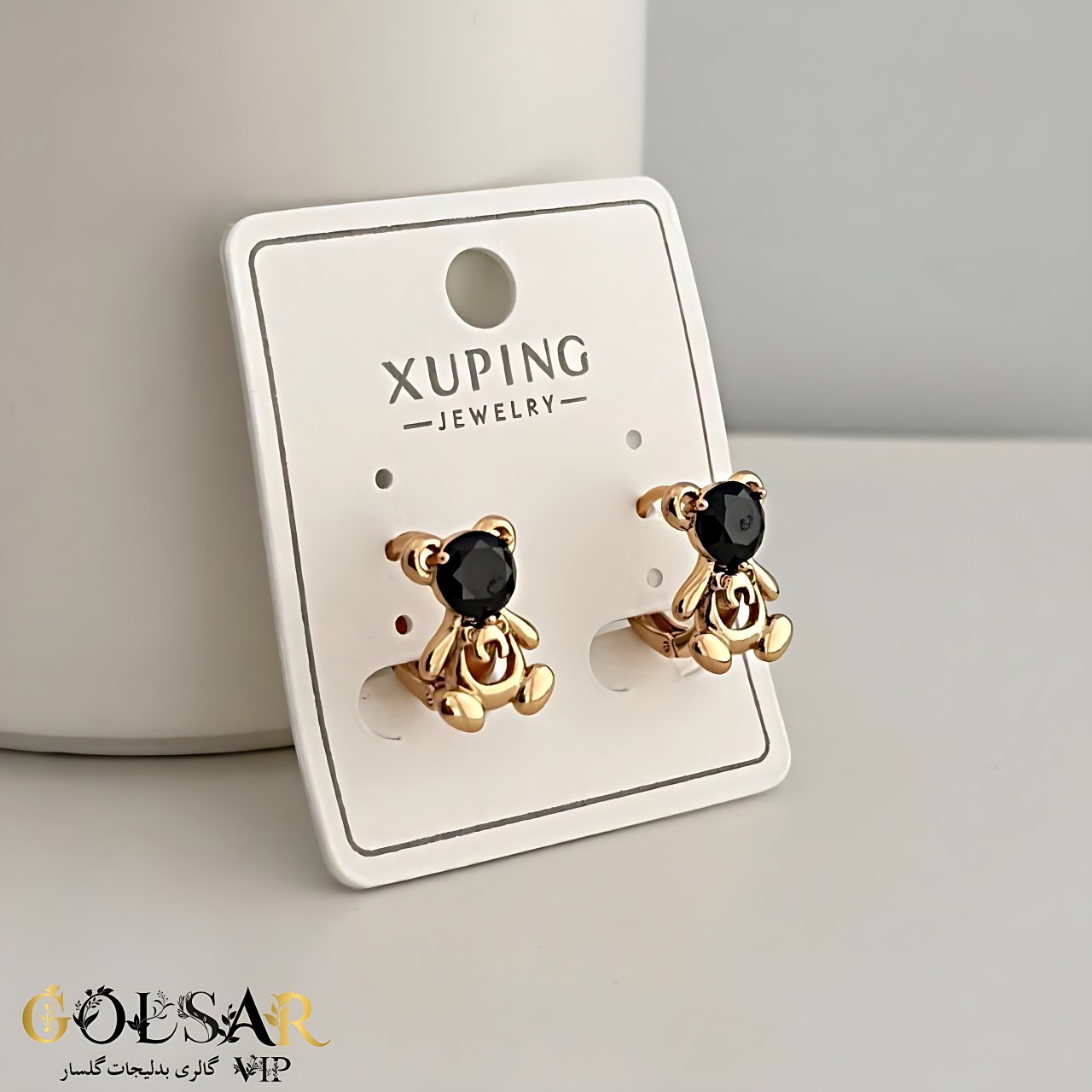 گوشواره تدی نگین مشکی رنگ ثابت و ضد حساسیت آلیاژ استیل با آبکاری طلا کیفیت بالا