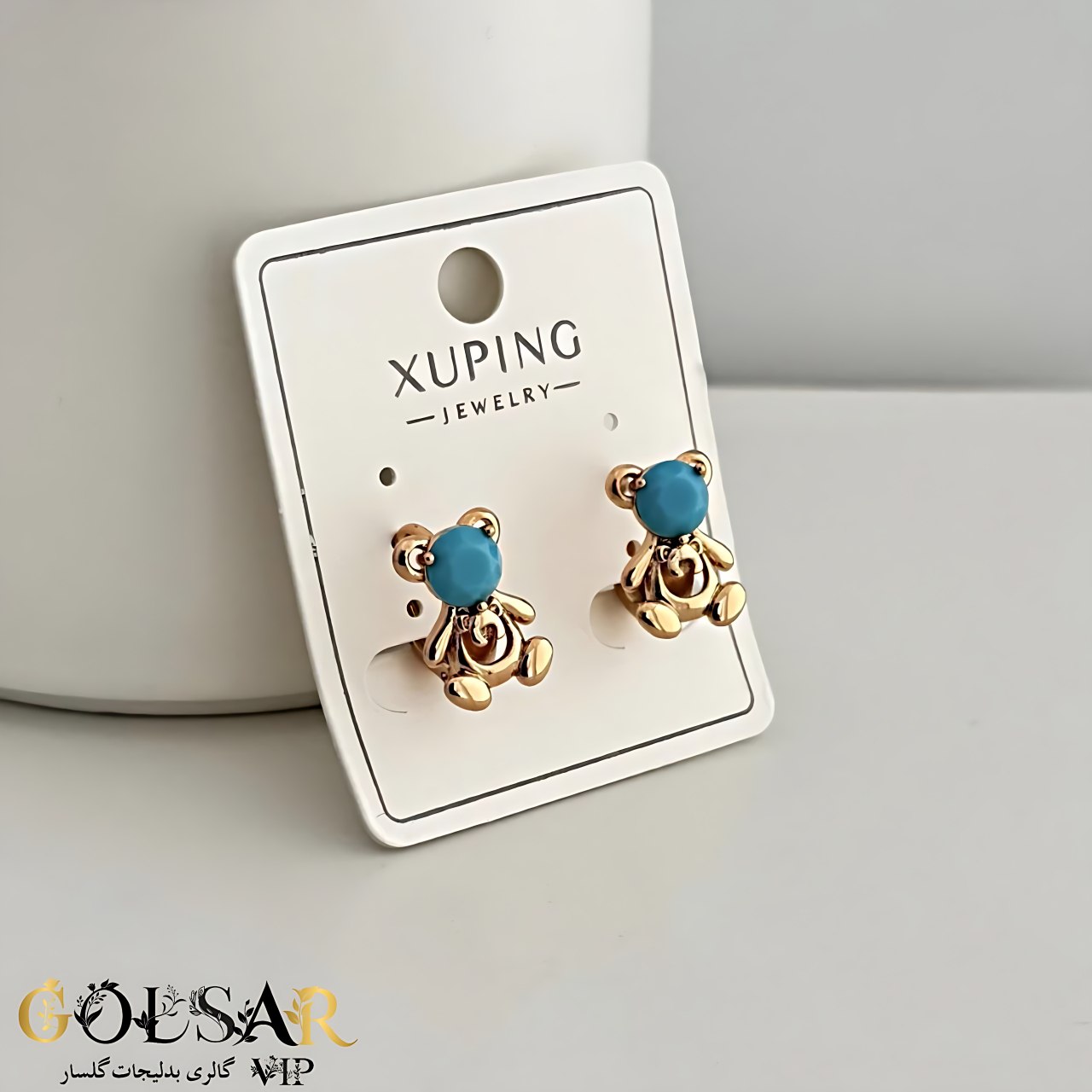 گوشواره تدی نگین فیروزه ای رنگ ثابت و ضد حساسیت آلیاژ استیل با آبکاری طلا کیفیت بالا